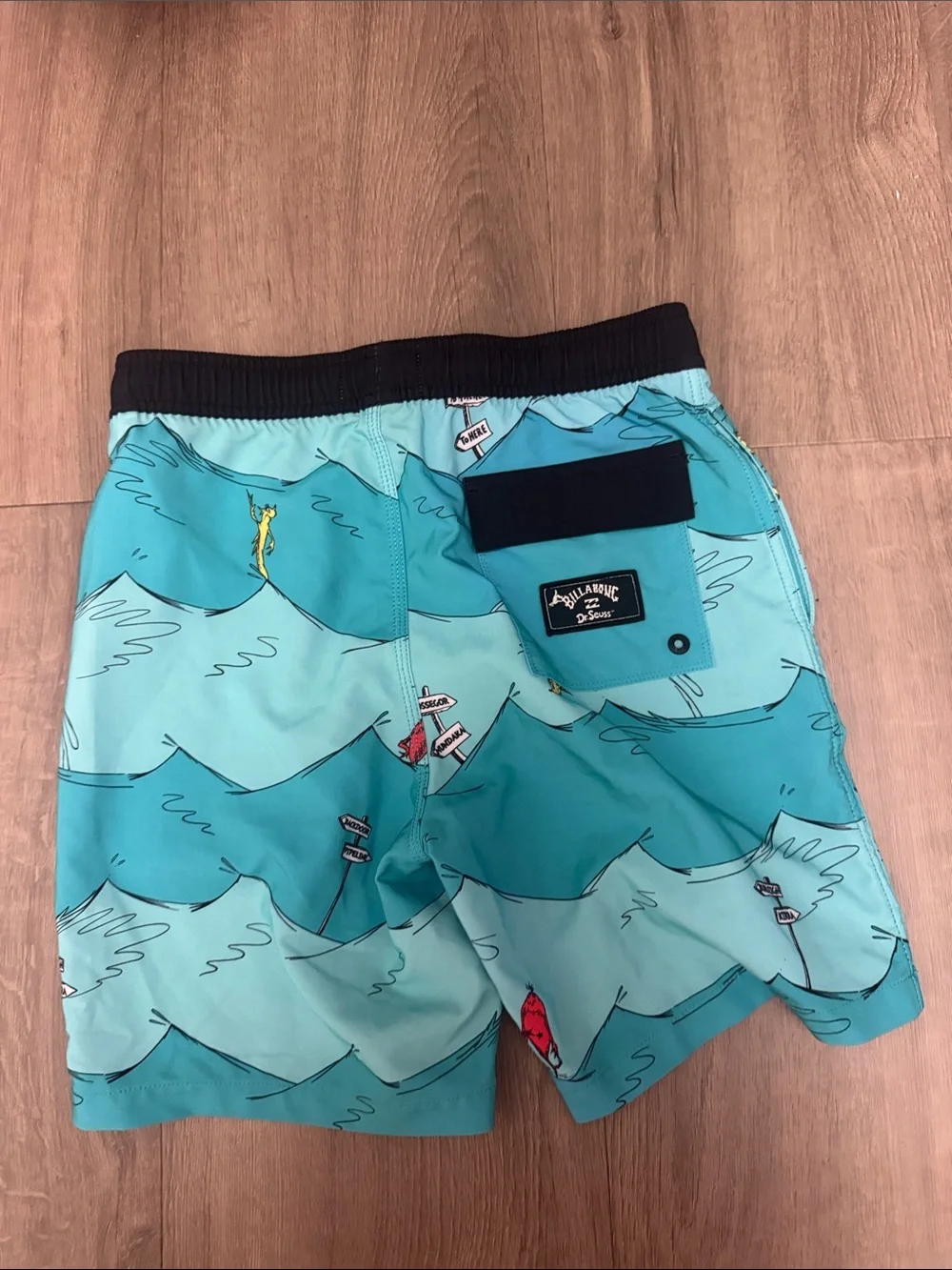 Billabong Kids Turquoise Wave Print Swim Trunks with Black Waistband. Waist 26
